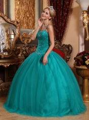 Turquoise Ball Gown Spaghetti Straps Floor-length Tulle Beading Quinceanera Dress