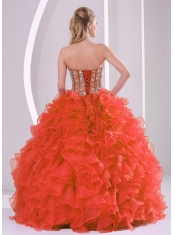 Classical Ball Gown With Sweetheart Ruffles and Beaded Decorate In Coral Red For Quinceanera Dresses
