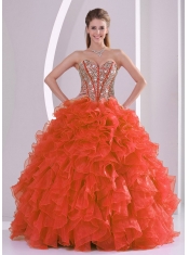 Classical Ball Gown With Sweetheart Ruffles and Beaded Decorate In Coral Red For Quinceanera Dresses