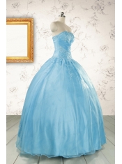 2015 Puffy Beading Baby Blue Quinceanera Dress with Wraps