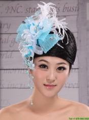 Feather and Rhinestones Decorate Aqua Blue Headpieces