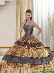 Elegant Strapless Leopard 2015 Gold Quince Dress with Ruffled Layers and Beading