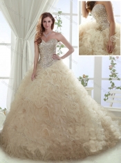Beautiful Beaded Bodice and Ruffled Brush Train Quinceanera Dress in Champagne