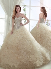 Beautiful Beaded Bodice and Ruffled Brush Train Quinceanera Dress in Champagne