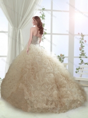 Beautiful Beaded Bodice and Ruffled Brush Train Quinceanera Dress in Champagne