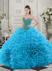 Latest Beaded and Ruffled Baby Blue Quinceanera Dress with Chapel Train