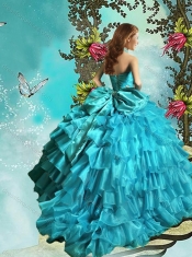 Elegant Halter Top Aqua Blue Quinceanera Dress with Ruffled Layers and Beading