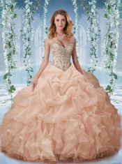 Beaded and Ruffled Aqua Blue Quinceanera Dress with Beaded Decorated Cap Sleeves