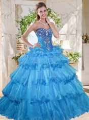 Elegant Puffy Skirt Beaded and Ruffled Layers Quinceanera Gown