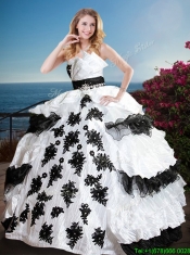 Fashionable Black and White Quinceanera Dress with Appliques and Ruffled Layers