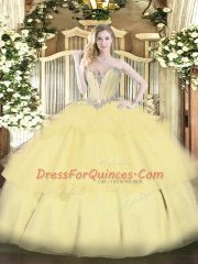 Sweetheart Sleeveless Quinceanera Dresses Floor Length Beading and Ruffled Layers Gold Tulle