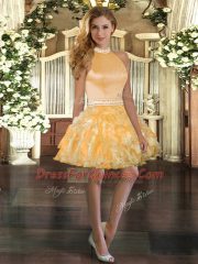 Vintage Halter Top Sleeveless Quinceanera Gown Floor Length Beading and Ruffles Gold Organza
