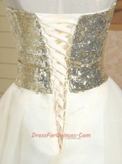 Customized Satin Strapless Sleeveless Lace Up Sequins and Bowknot Prom Dresses in Champagne