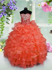 Sleeveless Organza Floor Length Lace Up Flower Girl Dress in Coral Red with Ruffled Layers and Sequins