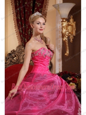 pink and black ball gowns