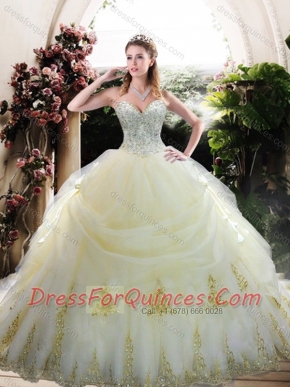 Custom Designed White Quinceanera Gown with Appliques and Beading