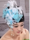 Feather and Rhinestones Decorate Aqua Blue Headpieces