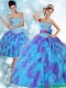 Elegant Beaded Strapless Multi Color Quinceanera Dresses with Ruffles and Sash