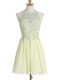 Light Yellow Chiffon Lace Up Halter Top Sleeveless Knee Length Dama Dress for Quinceanera Appliques