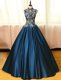 Latest Navy Blue A-line High-neck Sleeveless Satin Floor Length Backless Appliques Prom Dress
