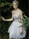 Stylish White Backless Straps Beading and Ruffles Prom Gown Organza Sleeveless