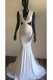 Spectacular Mermaid White V-neck Backless Ruching Prom Dresses Brush Train Sleeveless